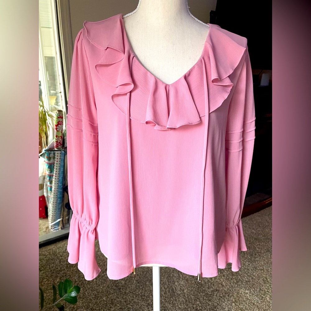 Nothing says Valentine’s Day like this classy, romantic top!